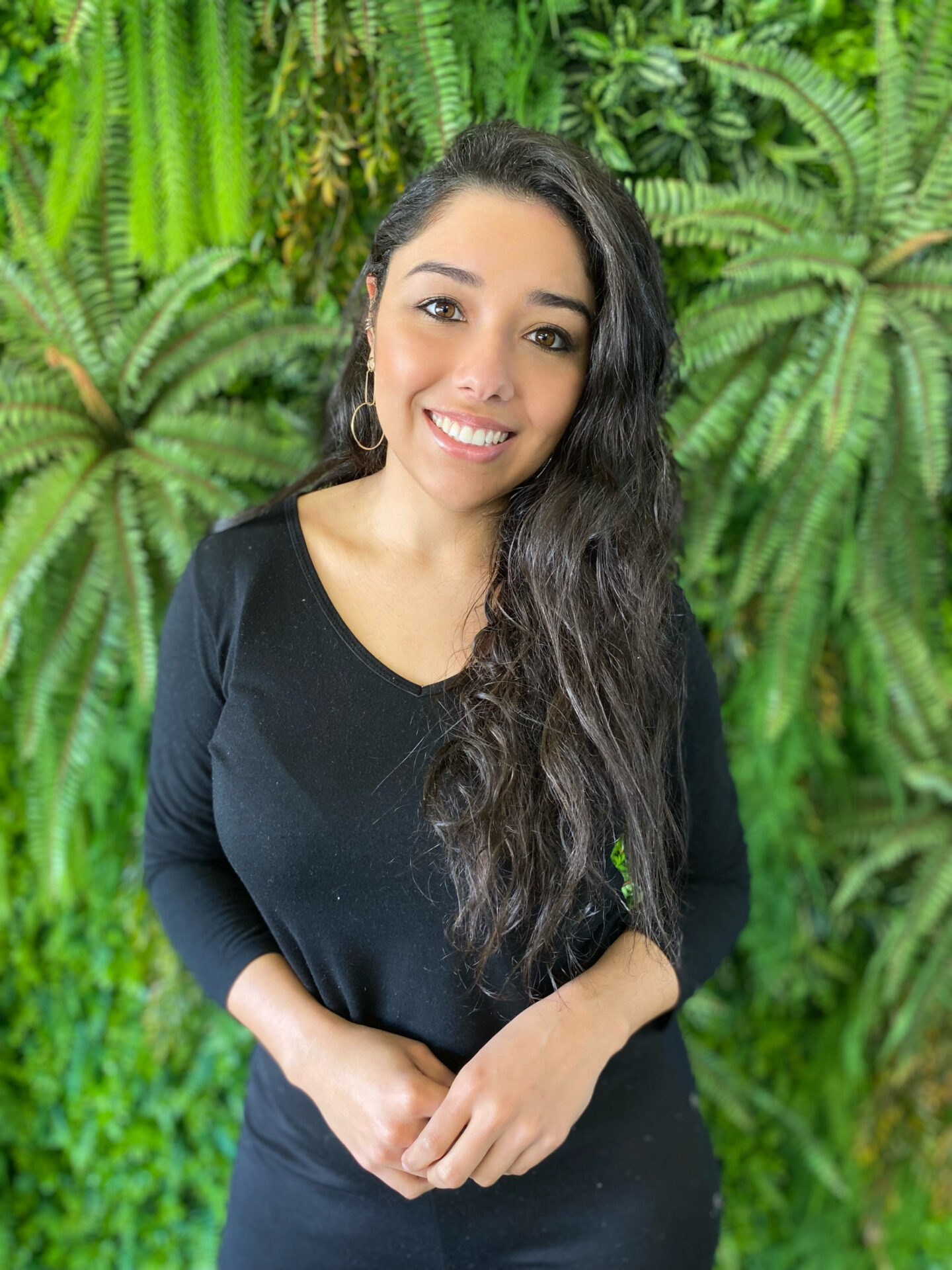 foto da equipe - Debora pucinelli ao fundo verde